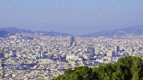 View of Barcelona from Montjuic. Church Sagrada Familia from above, in the city center. © romanklevets
