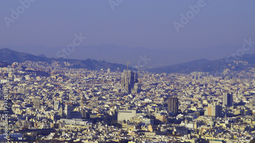 View of Barcelona from Montjuic. Church Sagrada Familia from above, in the city center.