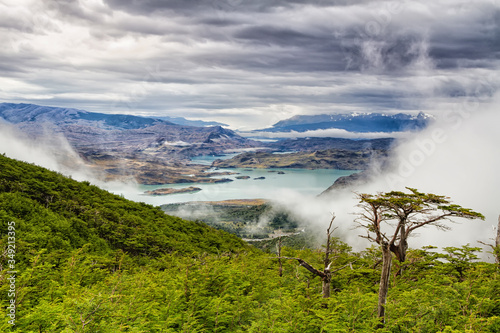 Epic beauty of the landscape - the National Park Torres del Paine in southern Chile. Lago Nordernskjold and mountains in the background photo