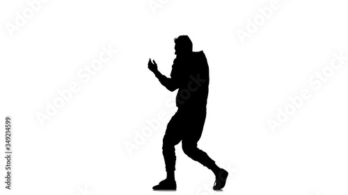 black silhouette on a white background, young energetic guy dancing hip hop, freestyle, street dance