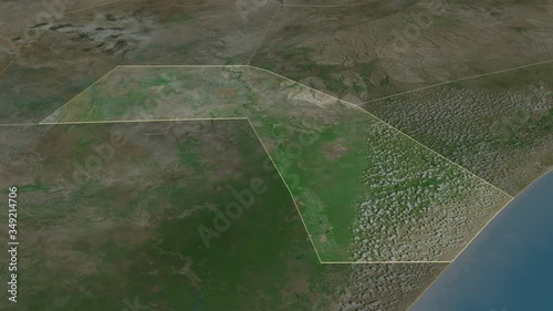 Jubbada Dhexe, region with its capital, zoomed and extruded on the satellite map of Somalia in the conformal Stereographic projection. Animation 3D photo