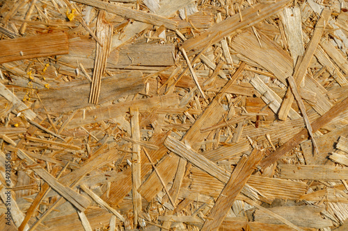 Natural yellow background from particle board close up