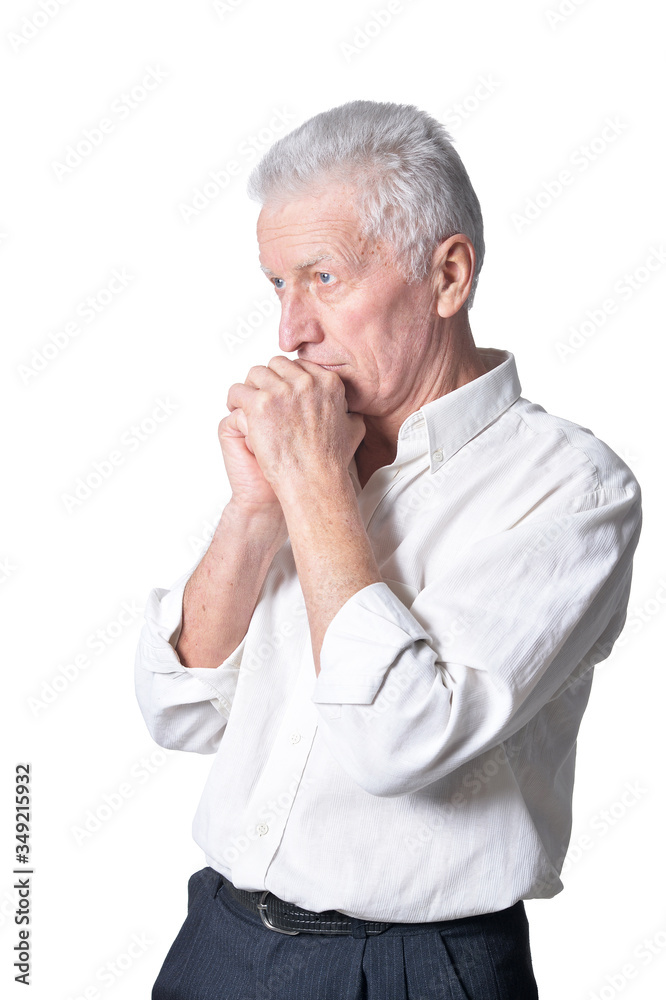 Sad senior man in casual clothing posing Sad senior man in casual clothing posing