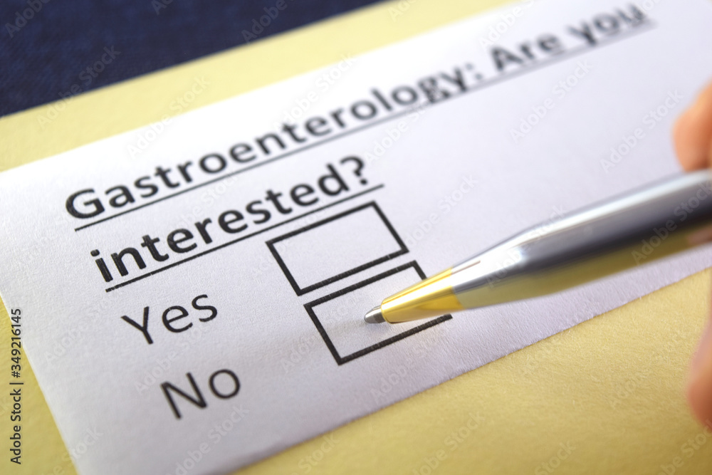 One person is answering question about gastroenterology. One person is answering question about gastroenterology.