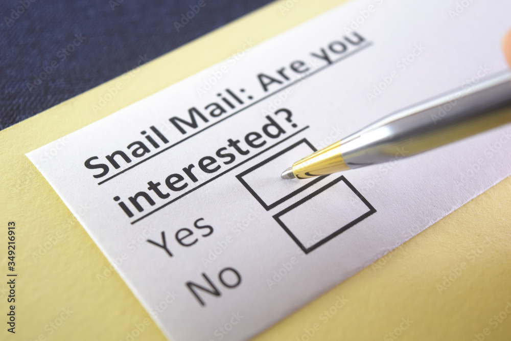 One person is answering question about snail mail. One person is answering question about snail mail.