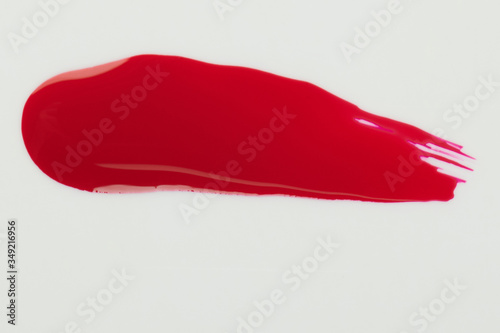 Red glossy paint stroke