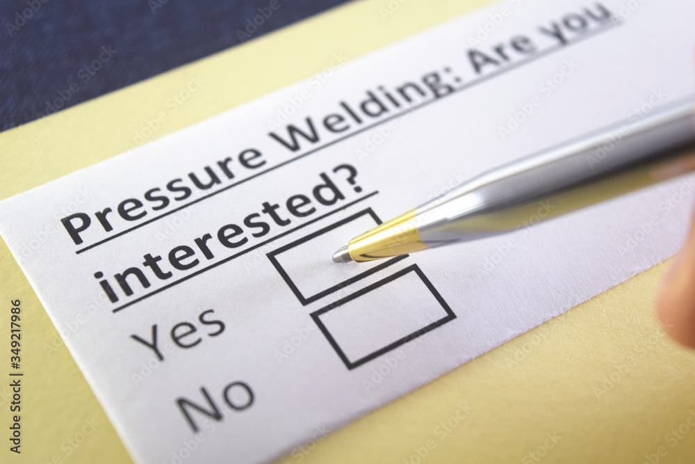 One person is answering question about pressure welding. One person is answering question about pressure welding.