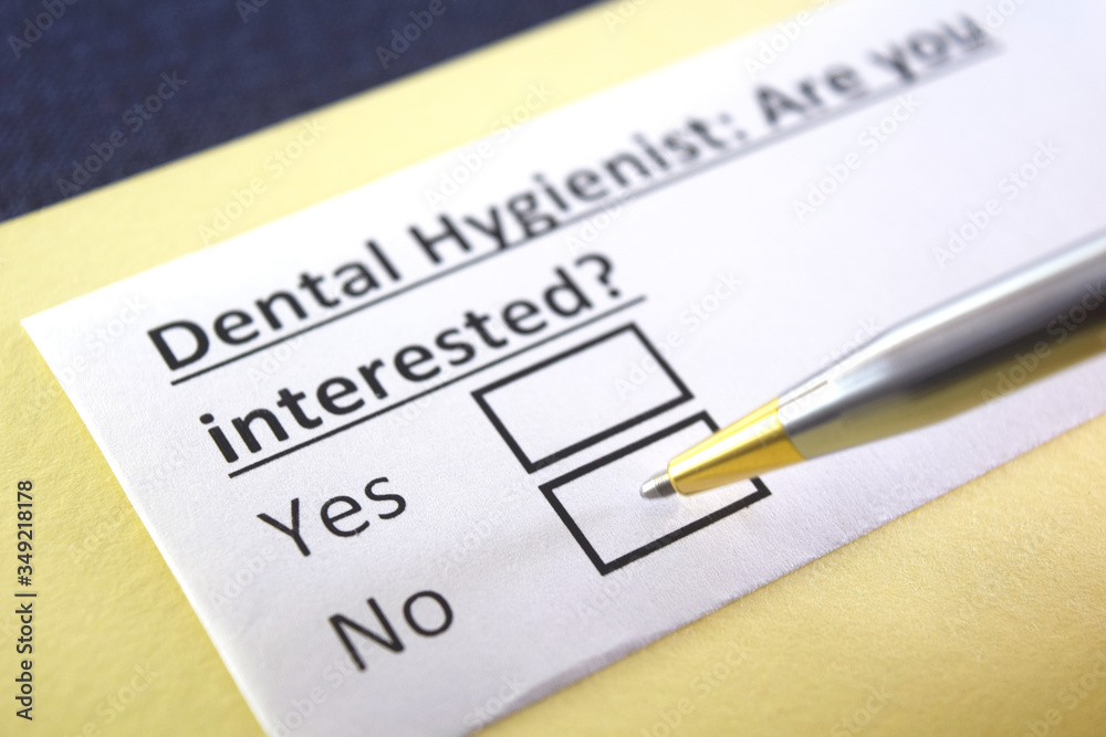 One person is answering question about dental hygiene. One person is answering question about dental hygiene.