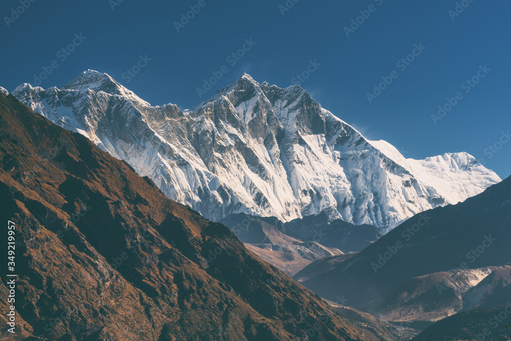 Beautiful nature landscape. Himalayan mountain range. Majestic and dangerous Lhotse and the highest peak Everest. Valley in the foreground. Nepal