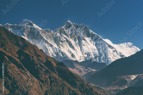 Beautiful nature landscape. Himalayan mountain range. Majestic and dangerous Lhotse and the highest peak Everest. Valley in the foreground. Nepal