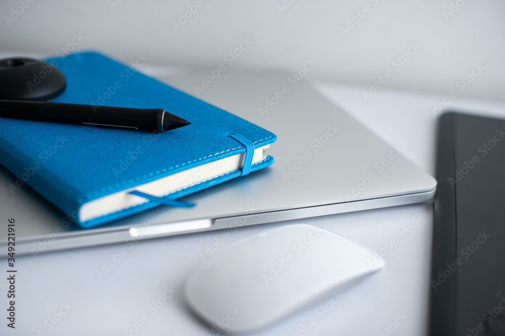 work from home to quarantine. computer equipment on the table. computer, mouse, notepad on a white table. remote work at home in self-isolation work from home to quarantine. computer equipment on the table. computer, mouse, notepad on a white table. remote work at home in self-isolation