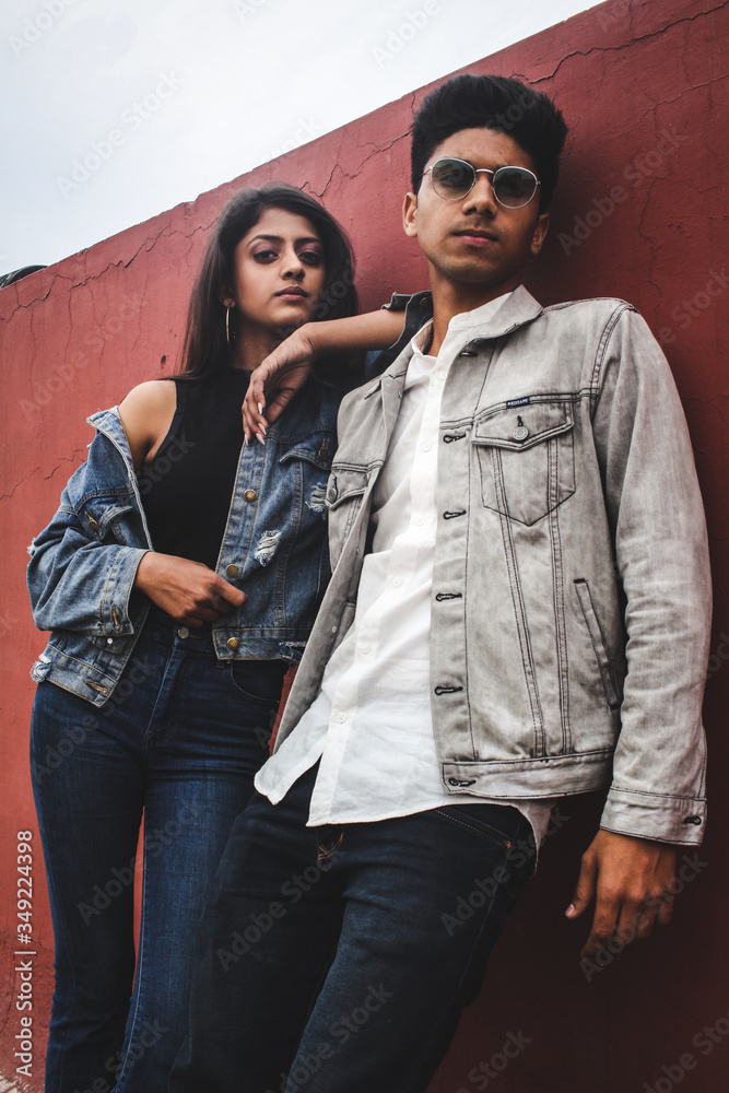 Young Indian couple posing for denim clothing 