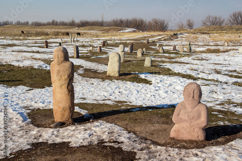 Kyrgyzstan - Tokmak - A group of balbans (stone carved pagan sculptures of ancestors) in the place of the disappeared medieval city of Balasagun on the Great Silk Road photo