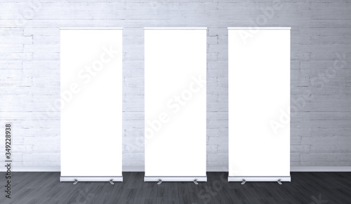 Empty three rollup banners stand. Blank template mockups. Exhibition stand 3 roll-up banners, screen for you design. Vertical white roll up for preview.