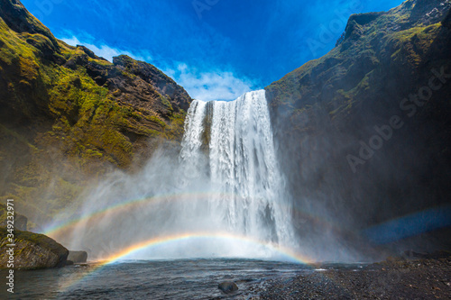 Rainbow at Skogafoss waterfall in the golden circle of south of Iceland