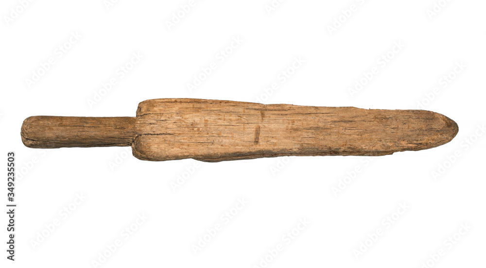 Old authentic wooden objects used by our ancestors. Isolate on a white background. Old objects of rural life. wooden spatula for washing clothes Old authentic wooden objects used by our ancestors. Isolate on a white background. Old objects of rural life. wooden spatula for washing clothes