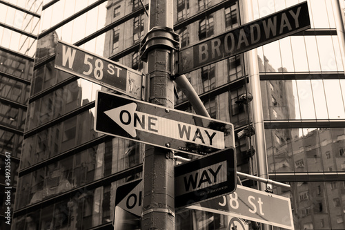 Street sign in New York City in sepia. © Marije Kouyzer