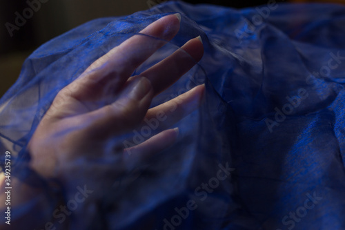 blue background light fabric texture and hand