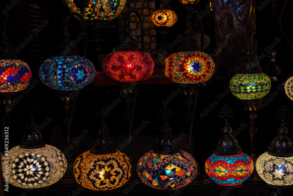 Beautiful paper lanterns in shape of stars as Christmas decorative elements lightning