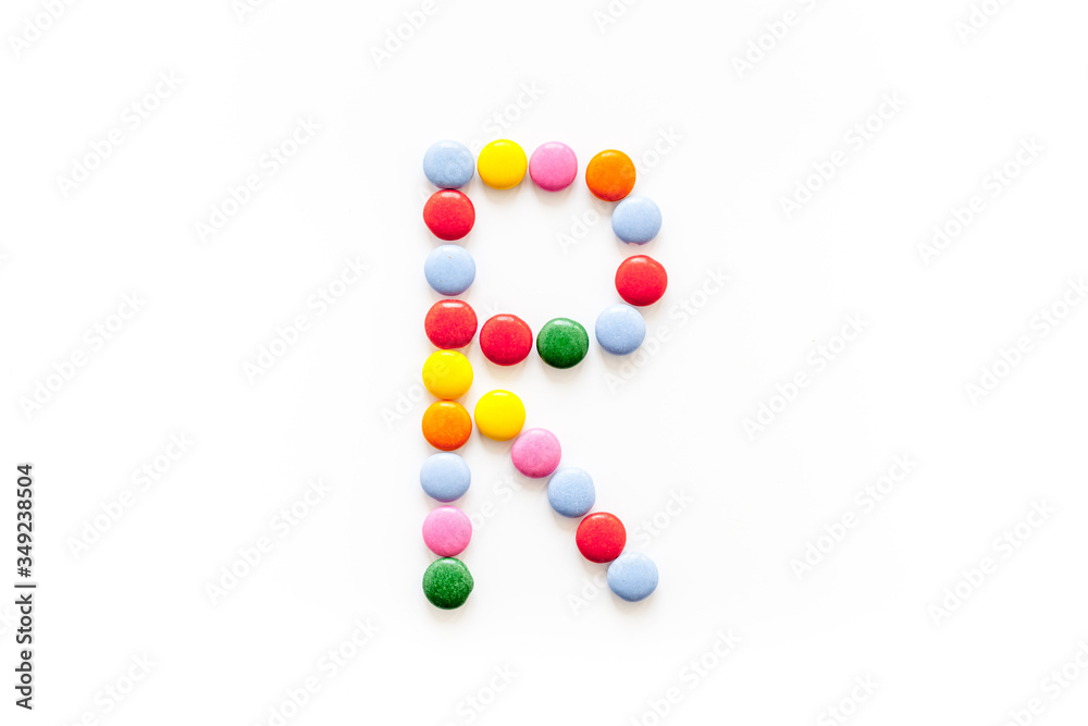 Candies font alphabet. Letter R isolated top view