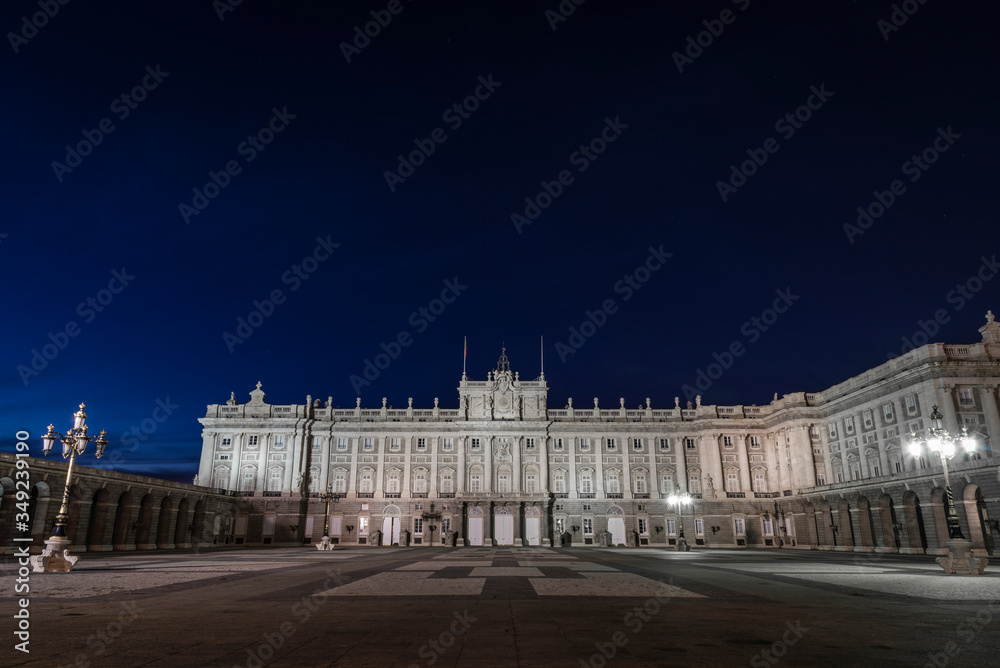 View of the front of the royal palace in Madrid at night, with its lighting. Spain.