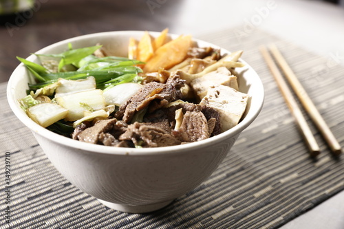 Bowl with vegetables, mushrooms and beef