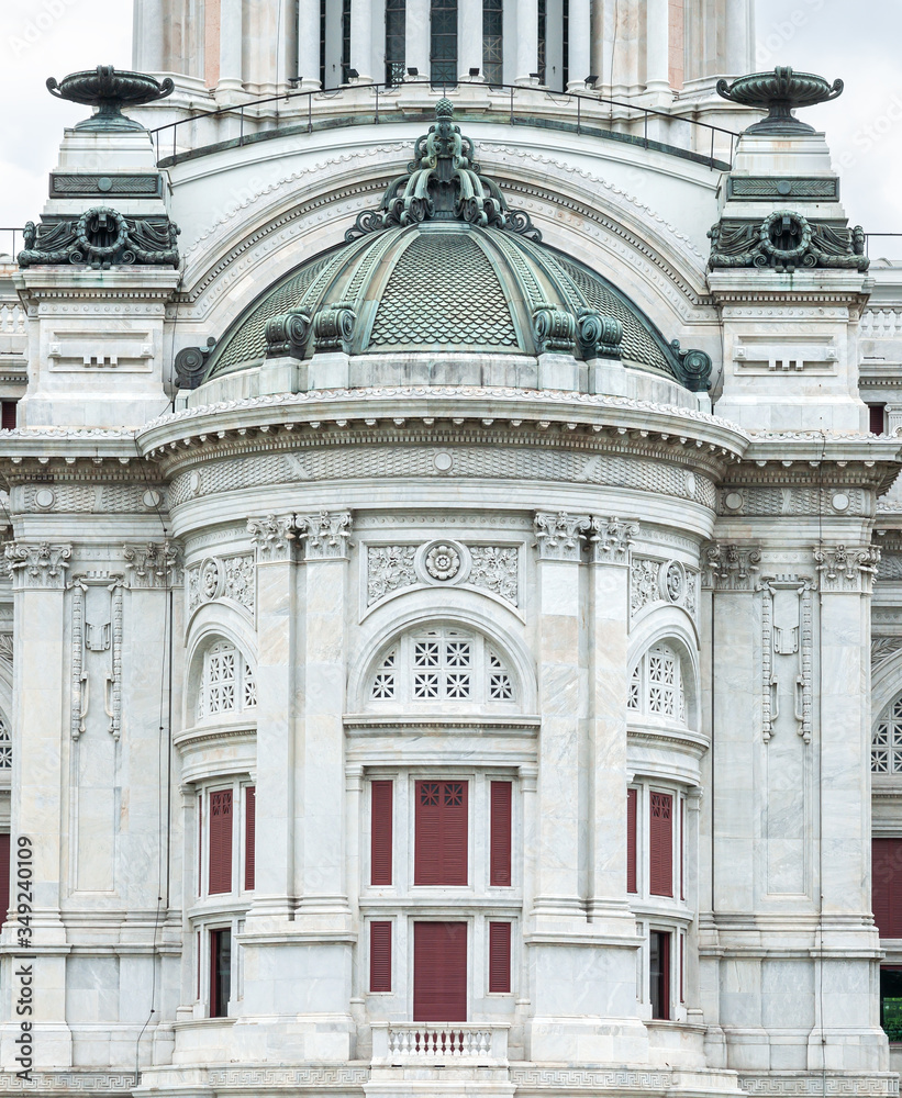 Beautiful ancient carved marble statues sculptures architecture with copper roof tiles decorated outside Ananta Samakhom Throne Hall Bangkok, Thailand