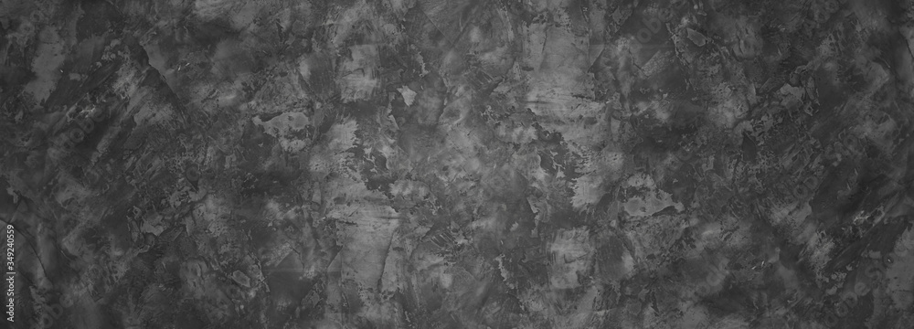 Fototapeta premium Dark gray wall with concrete texture and vignette as a background or wallpaper for studio display your products.