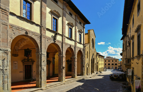  Detail of main square with cathedral entrance in old historic alley in the medieval village of Sansepolcro near city of Arezzo in Tuscany  