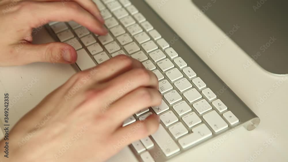 hands typing on keyboard. Man working at the computer. Office worker hands typing on keyboard. Man working at the computer. Office worker