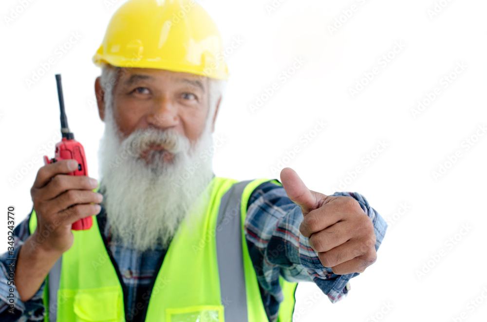 Asian white haired and bearded elderly engineer in Protective helmet gives a thumbs up looking straight at the camera, white background, selective focus, with clipping path Asian white haired and bearded elderly engineer in Protective helmet gives a thumbs up looking straight at the camera, white background, selective focus, with clipping path