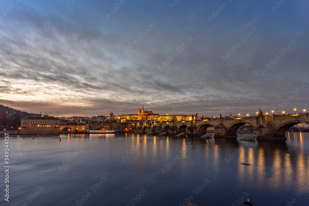 Charles Bridge Prague, leading to Prague Castle at night.