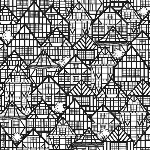 Seamless pattern with old german houses. Black and white buildings background. Vector illustration.
