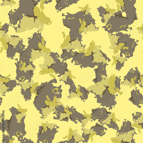 Desert camouflage of various shades of grey, yellow and brown colors