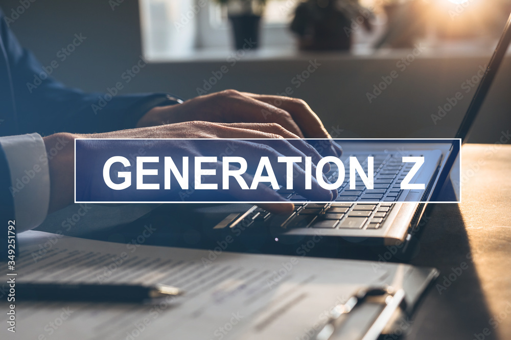 
Young businessman working on laptop. Concept of Generation Z