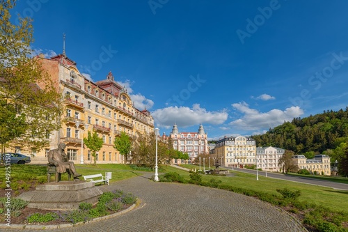 Goethe square with fountain, statue of J.W.Goethe and hotels - center of small west bohemian spa town Marianske Lazne (Marienbad) - Czech Republic