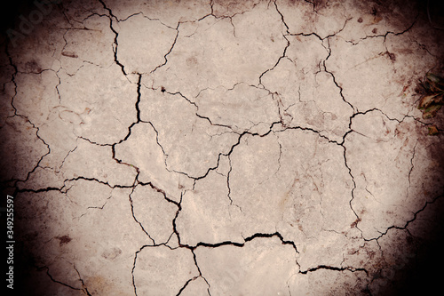 Cracks grunge texture earth background. Abstract dirty poster for design. Horizontal image.