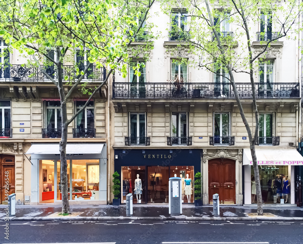 Paris, France circa January, 2020: Parisian architecture and historical  buildings, restaurants and boutique stores on streets of Paris, France  Stock Photo | Adobe Stock