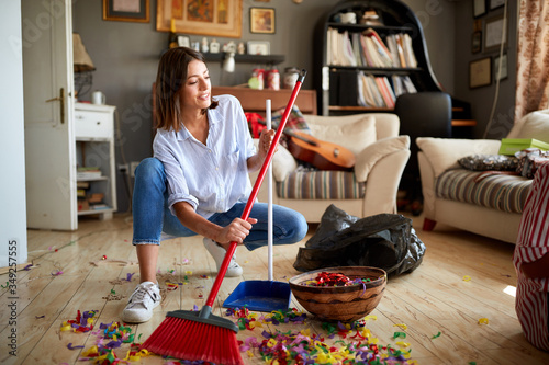 Female cleaning after party