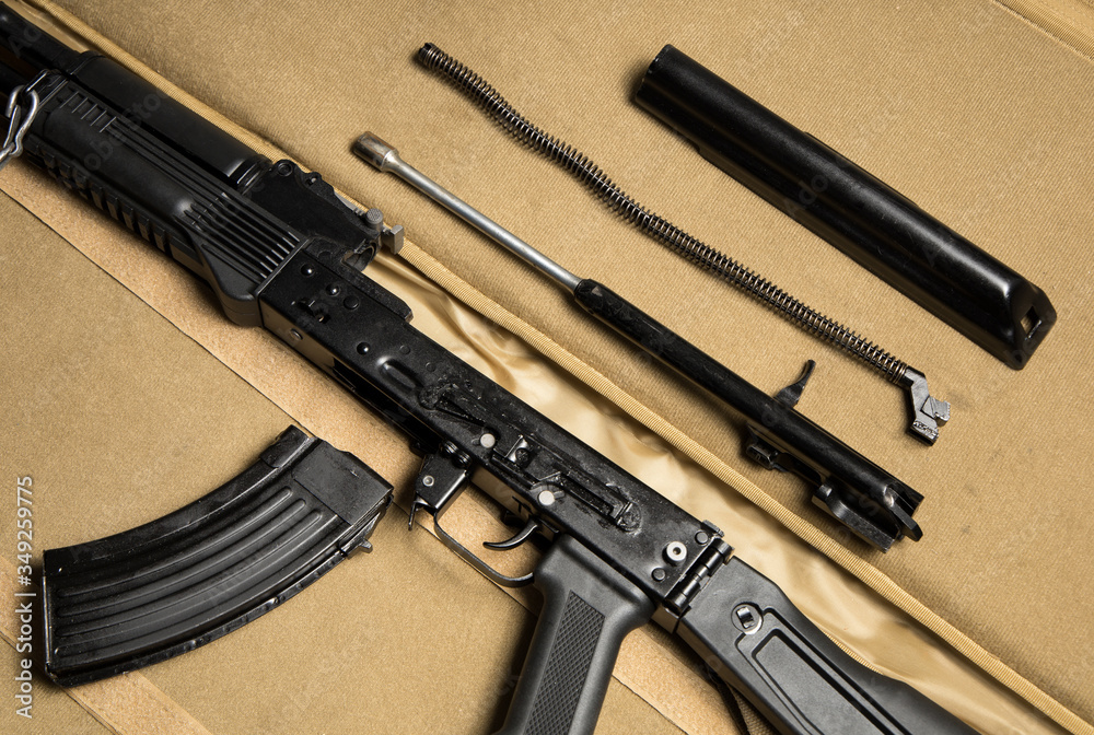 Top view of the basic parts of a disassembled assault rifle. Russian Kalashnikov MKK104 (latest