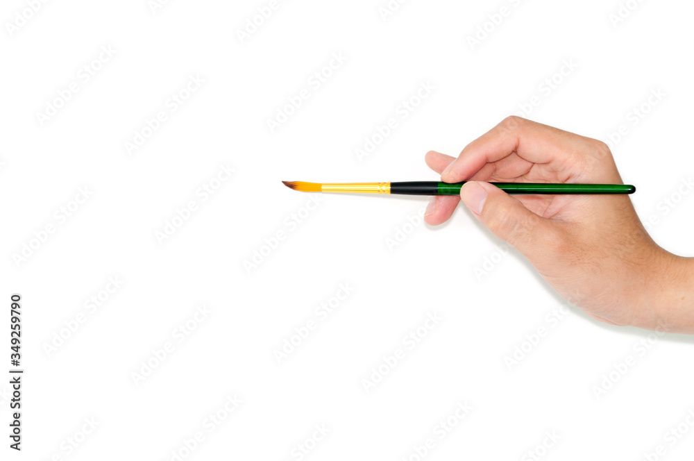 Closeup Hand holding paint brush isolated on white background – image Closeup Hand holding paint brush isolated on white background – image