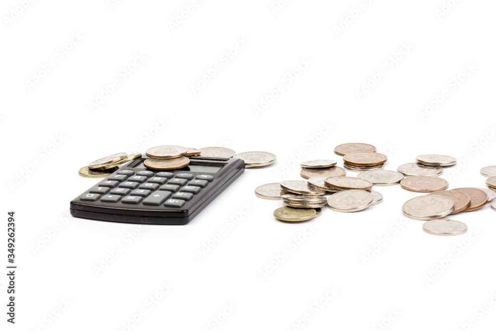 The coin with calculator on white background, concept of calculating expenses, incomes and expenses. The coin with calculator on white background, concept of calculating expenses, incomes and expenses.