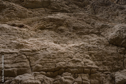 rocks made of stone against the background of the sun