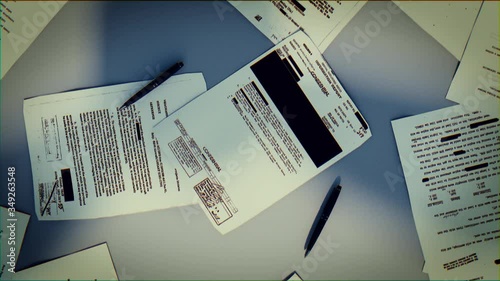 Top Secret concept background. Mystery documents of fbi or cia on a grey table and shadows playing on it.
