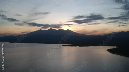 Wallpaper Mural take-off time lapse on a background of a volcano on the island of Lombok Pulau Lombok West Nusa Tenggara at dawn fishing boats are visible Torontodigital.ca