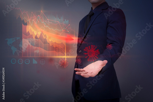  Businessman is analyzing economic data falling due to the coronavirus (Covid-19) pandemic crisis, World Economic crisis concept