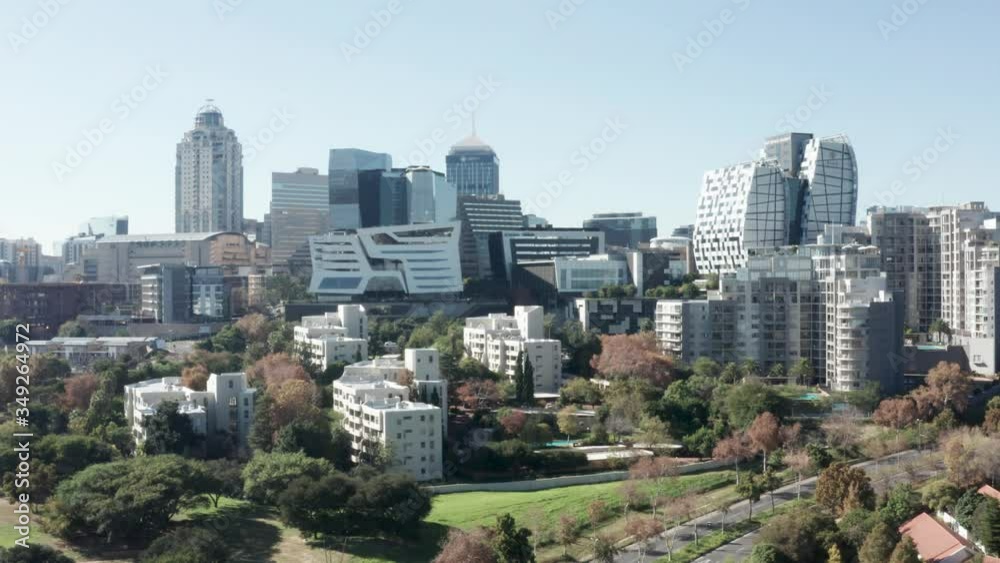Aerial view of the Sandton City skyline on a sunny day in Johannesburg, South Africa.