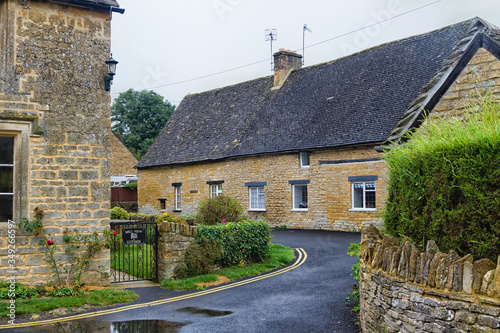 Old style English house in The Cotswolds know as Area Of Outstanding Beauty (AONB), England, United Kingdom, Europe photo