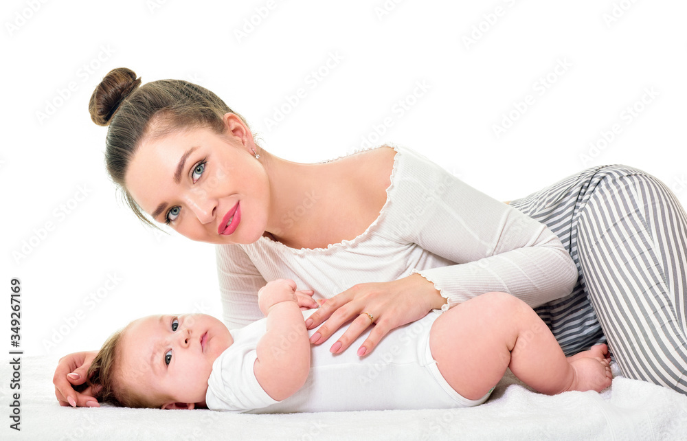 Mother and baby playing and smiling. Happy family. Mother and baby playing and smiling. Happy family.