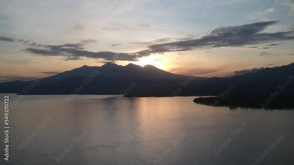 landing against the background of a volcano on the island of Lombok Pulau Lombok West Nusa Tenggara fishing boats are visible at dawn landing against the background of a volcano on the island of Lombok Pulau Lombok West Nusa Tenggara fishing boats are visible at dawn
